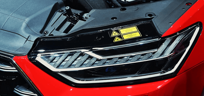 Close-up of a car headlight serviced at GT Auto Centre